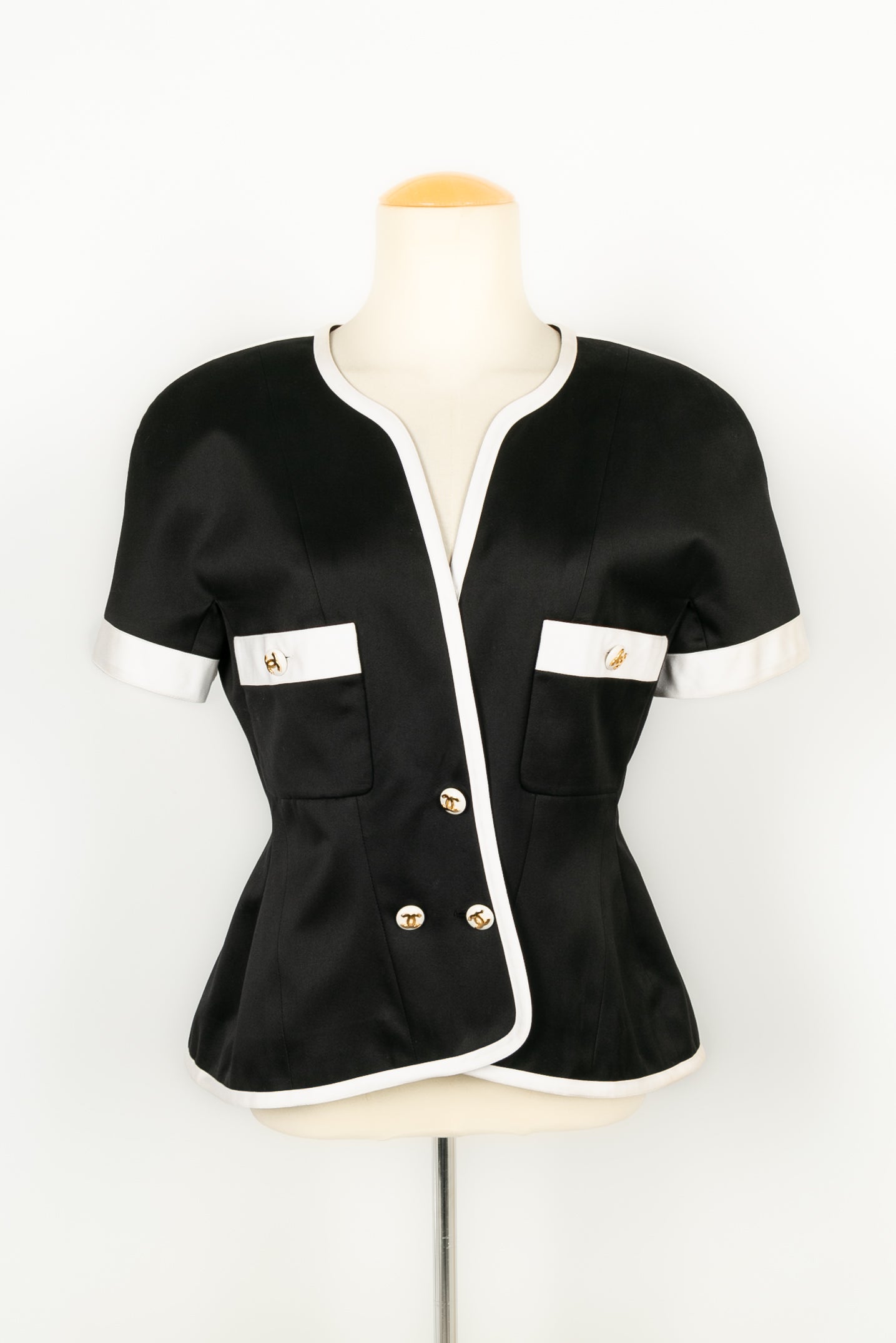 Chanel short clearance sleeve jacket