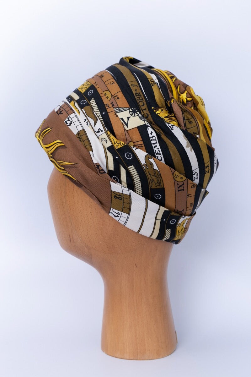 Hermès silk turban with "Astrologie"print