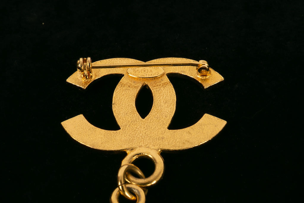 Broche dorée Chanel 1995