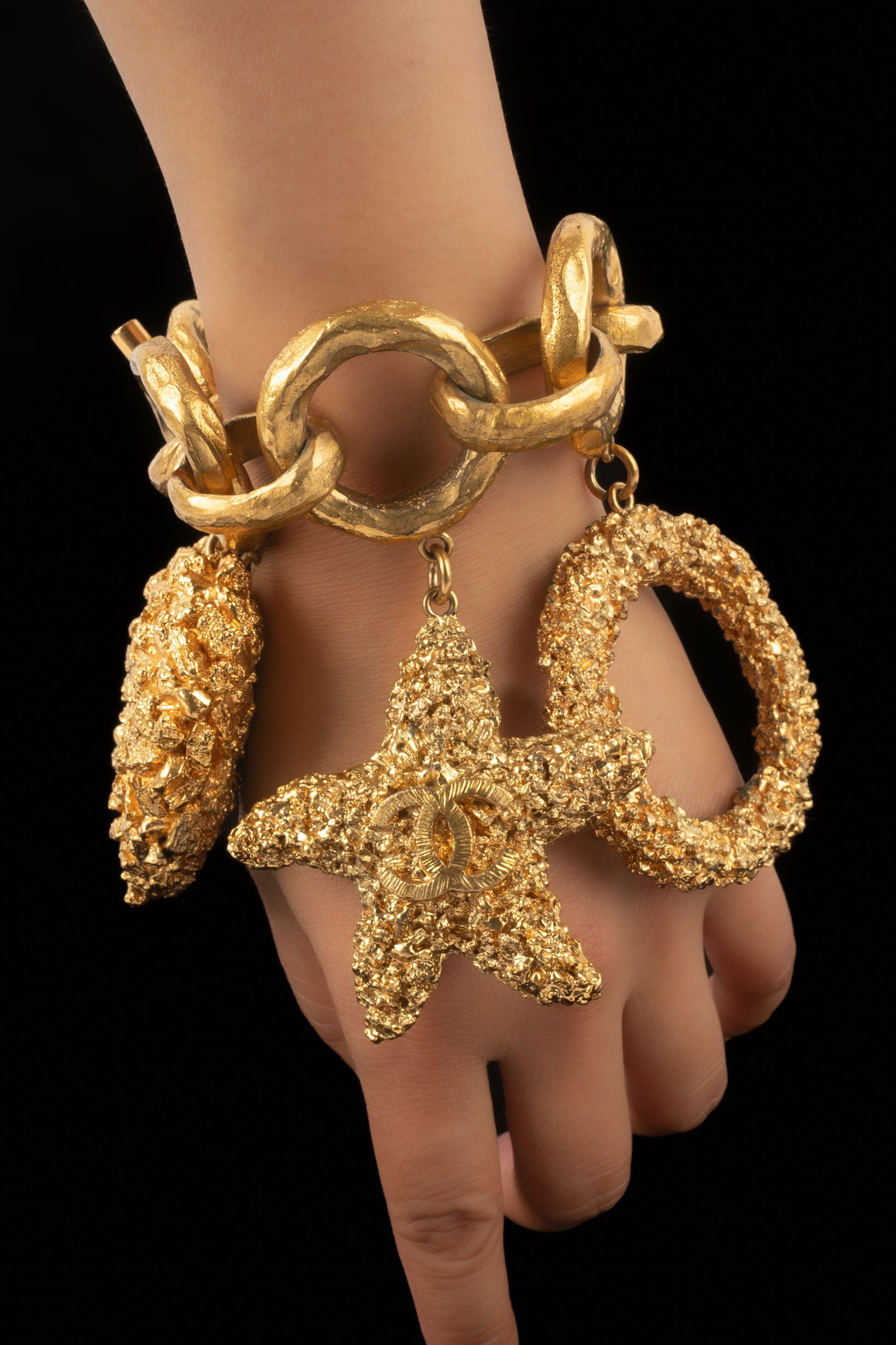 Bracelet breloques Chanel Croisière 1993