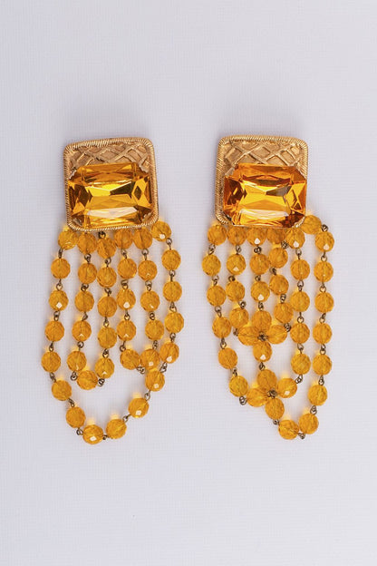 Boucles d'oreilles dorées Rochas