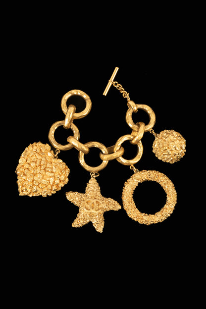 Bracelet breloques Chanel Croisière 1993