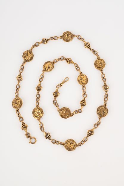 Collier doré Chanel