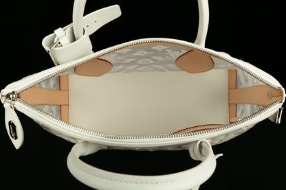 Sac "Lockit Est Ouest" Louis Vuitton été 2012