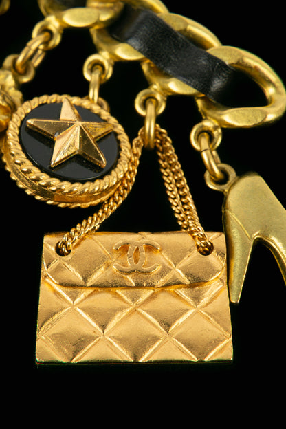 Broche breloques Chanel été 1995