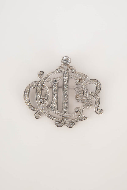 Broche argentée Dior