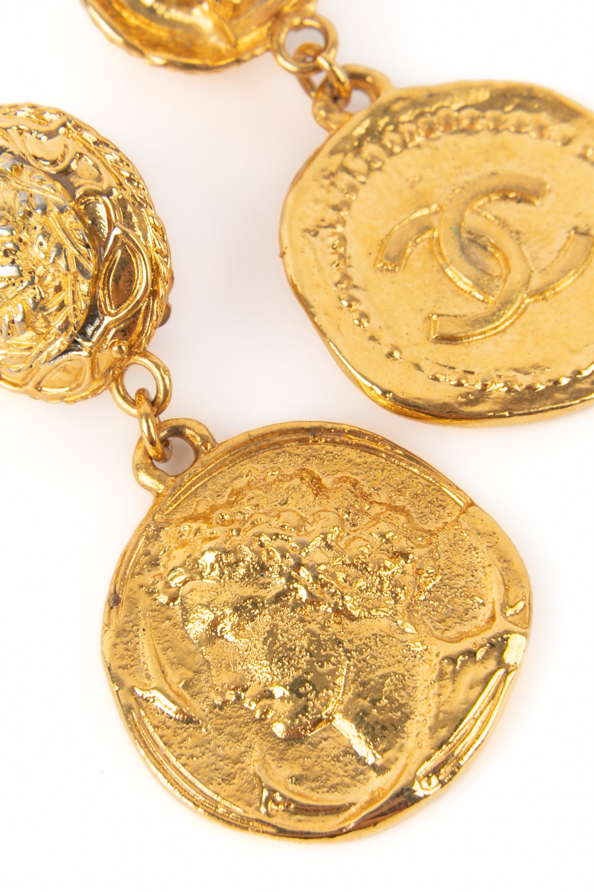 Boucles d'oreilles dorées Chanel 