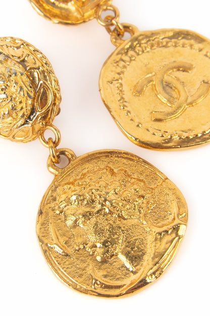 Boucles d'oreilles dorées Chanel 