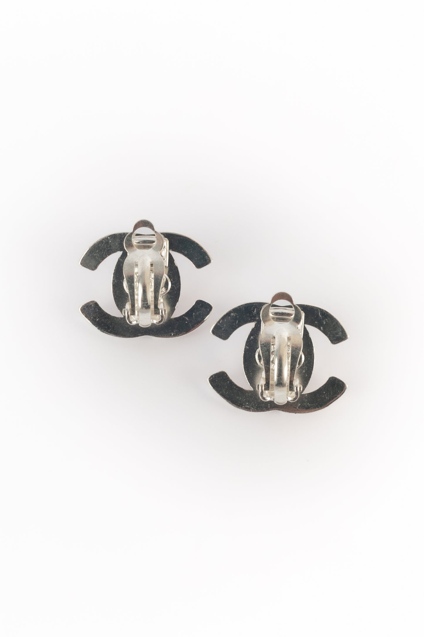 Boucles d'oreilles Turnlock Chanel Hiver 1997