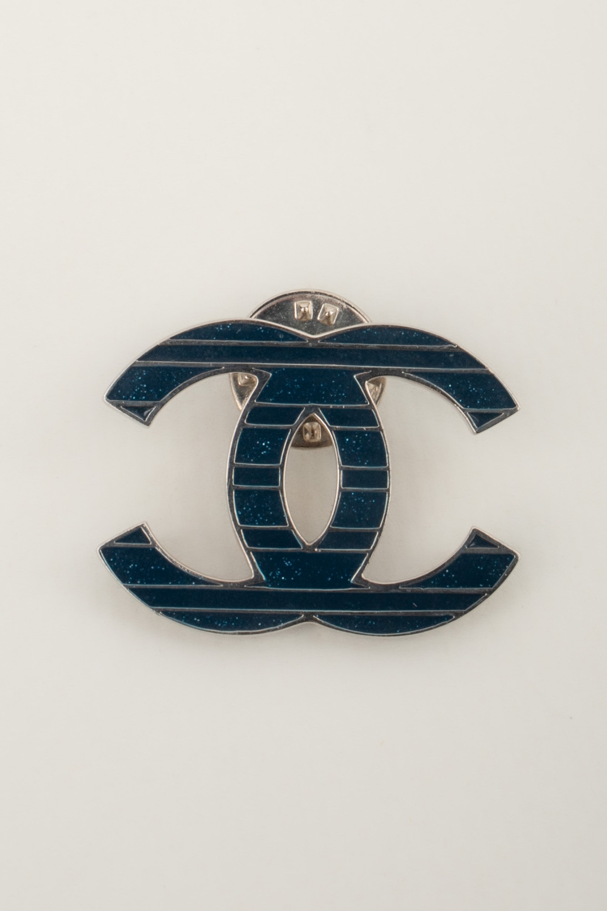 Chanel cc pin label by Karl Lagerfeld circa 2015 – Les Merveilles