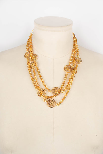 Collier doré Chanel