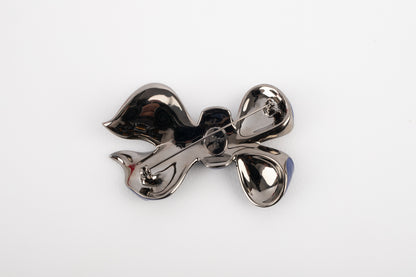 Broche noeud Dior