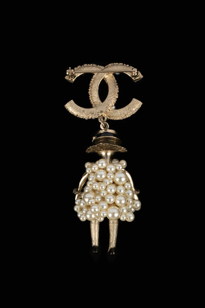Broche figurine Chanel 2014