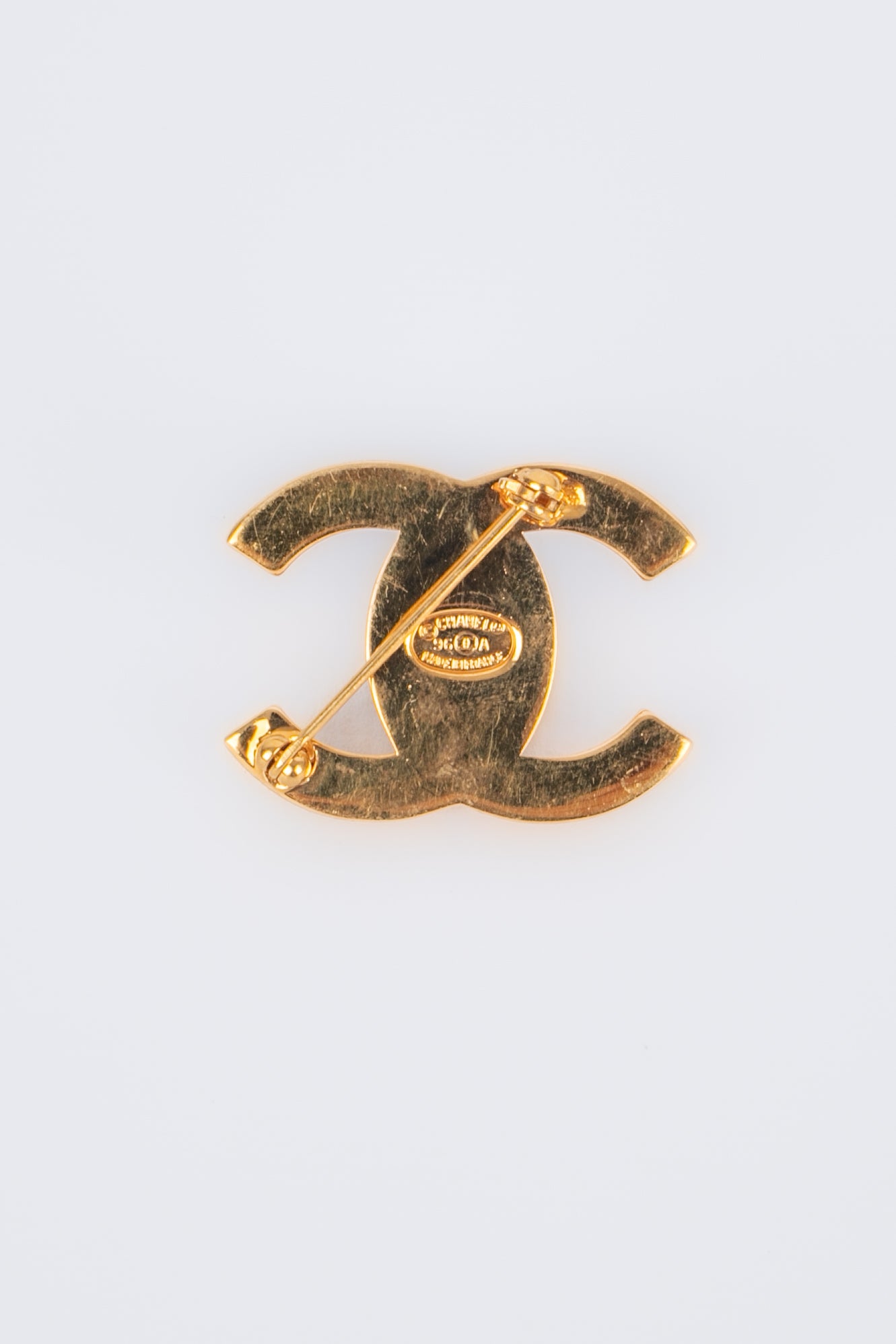 Broche tourniquet Chanel 1996