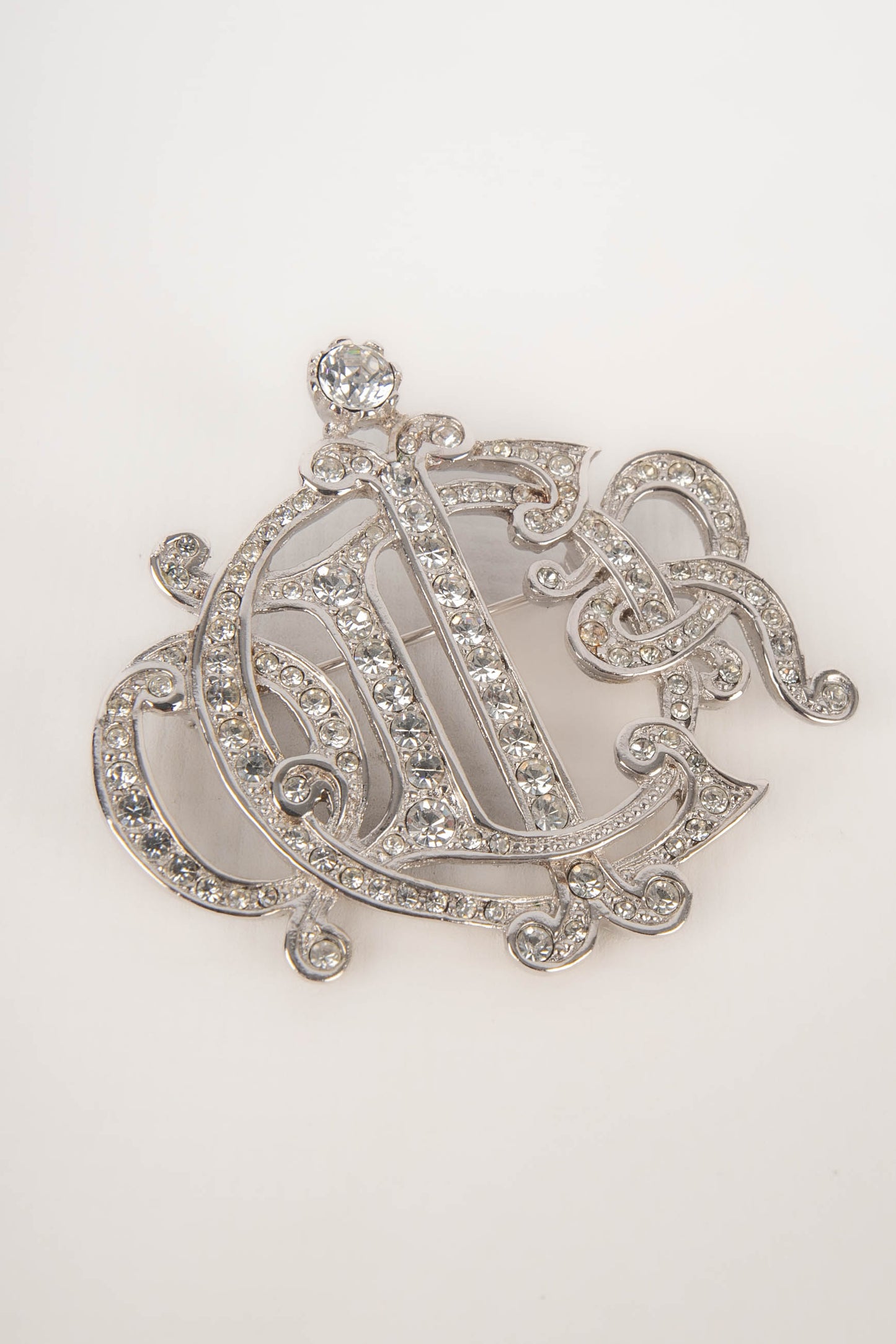 Broche argentée Dior