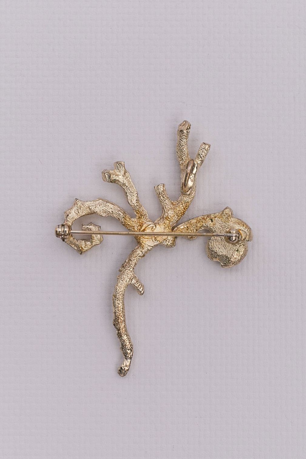 Broche dorée Christian Lacroix