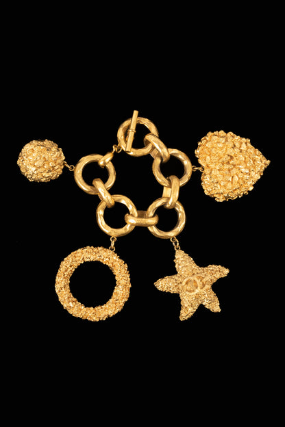 Bracelet breloques Chanel Croisière 1993