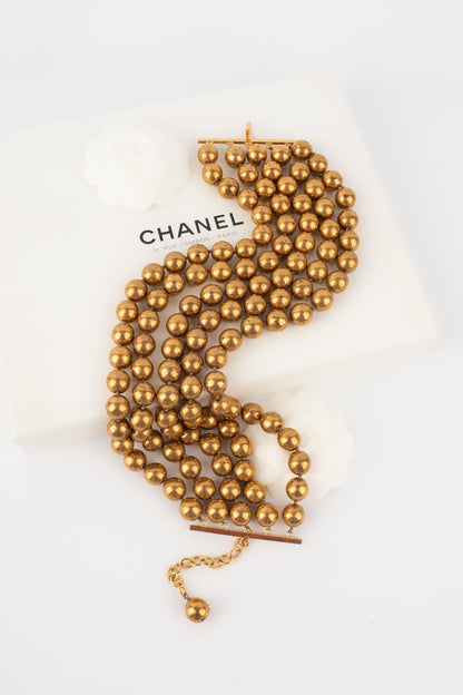 Collier de perles dorées Chanel 