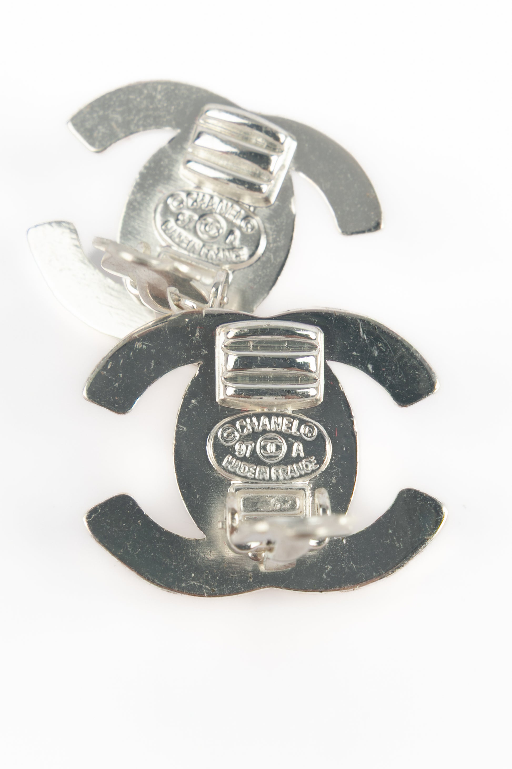 Boucles d'oreilles Turnlock Chanel Hiver 1997