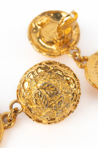 Boucles d'oreilles dorées Chanel 