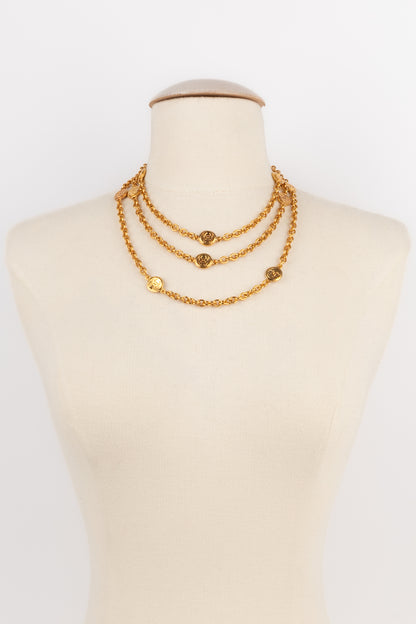 Collier doré Chanel 