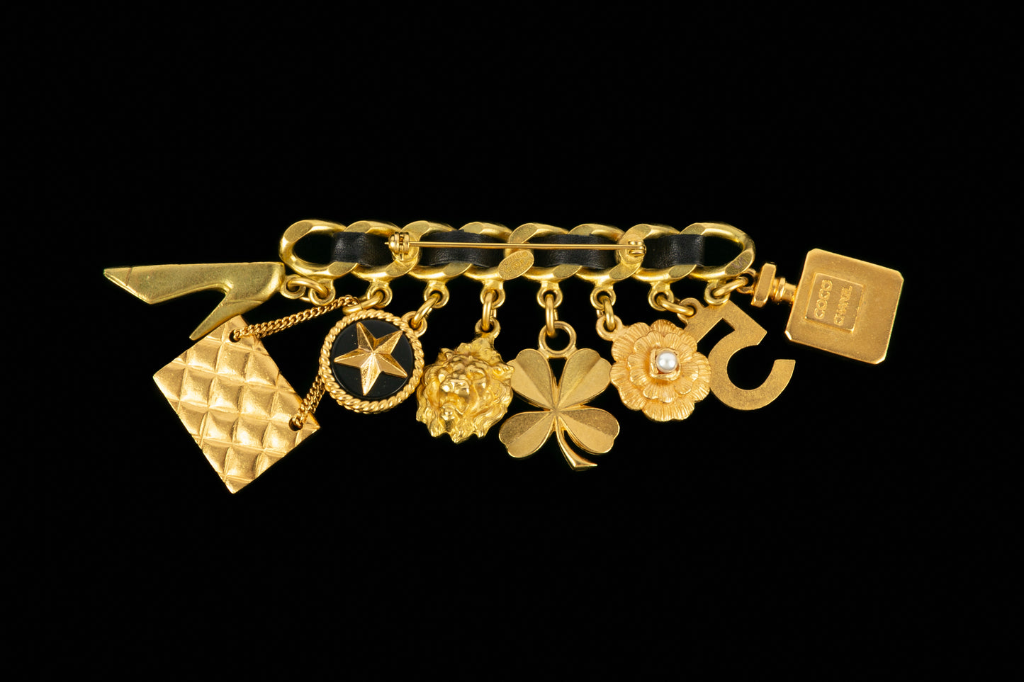 Broche breloques Chanel été 1995