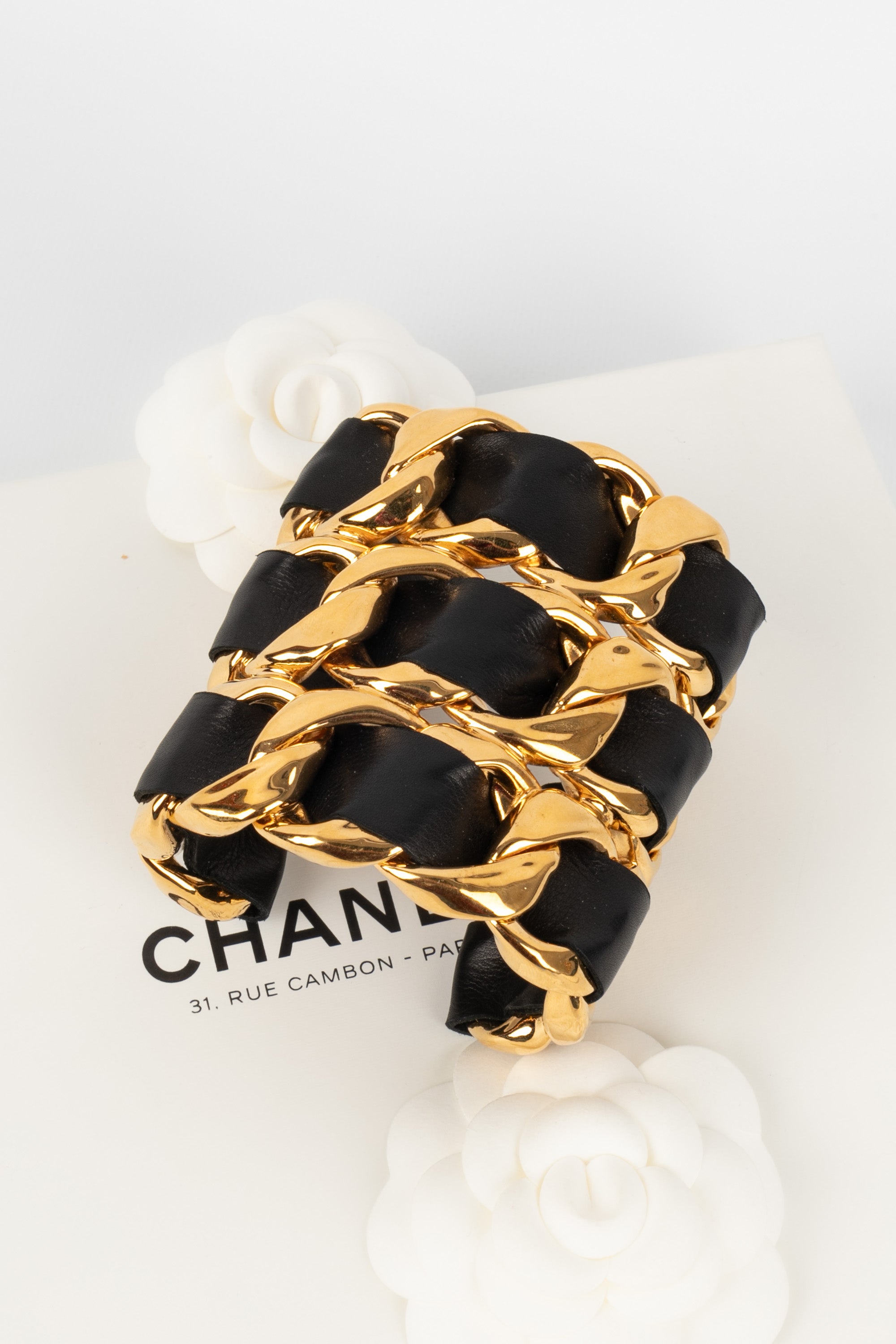 Chanel Vintage Iconic Gold Triple Row Chain and Black Leather Cuff Bra –  Amarcord Vintage Fashion