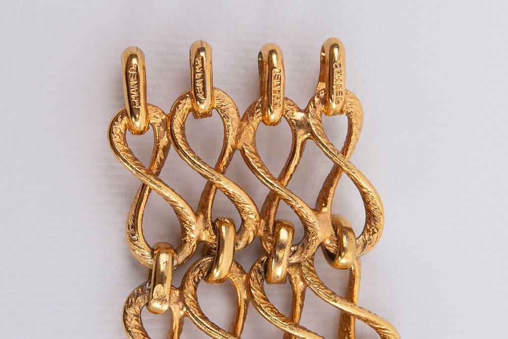 Bracelet articulé en métal doré Chanel