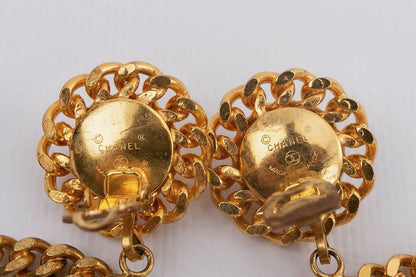 Boucles d'oreilles dorées Chanel