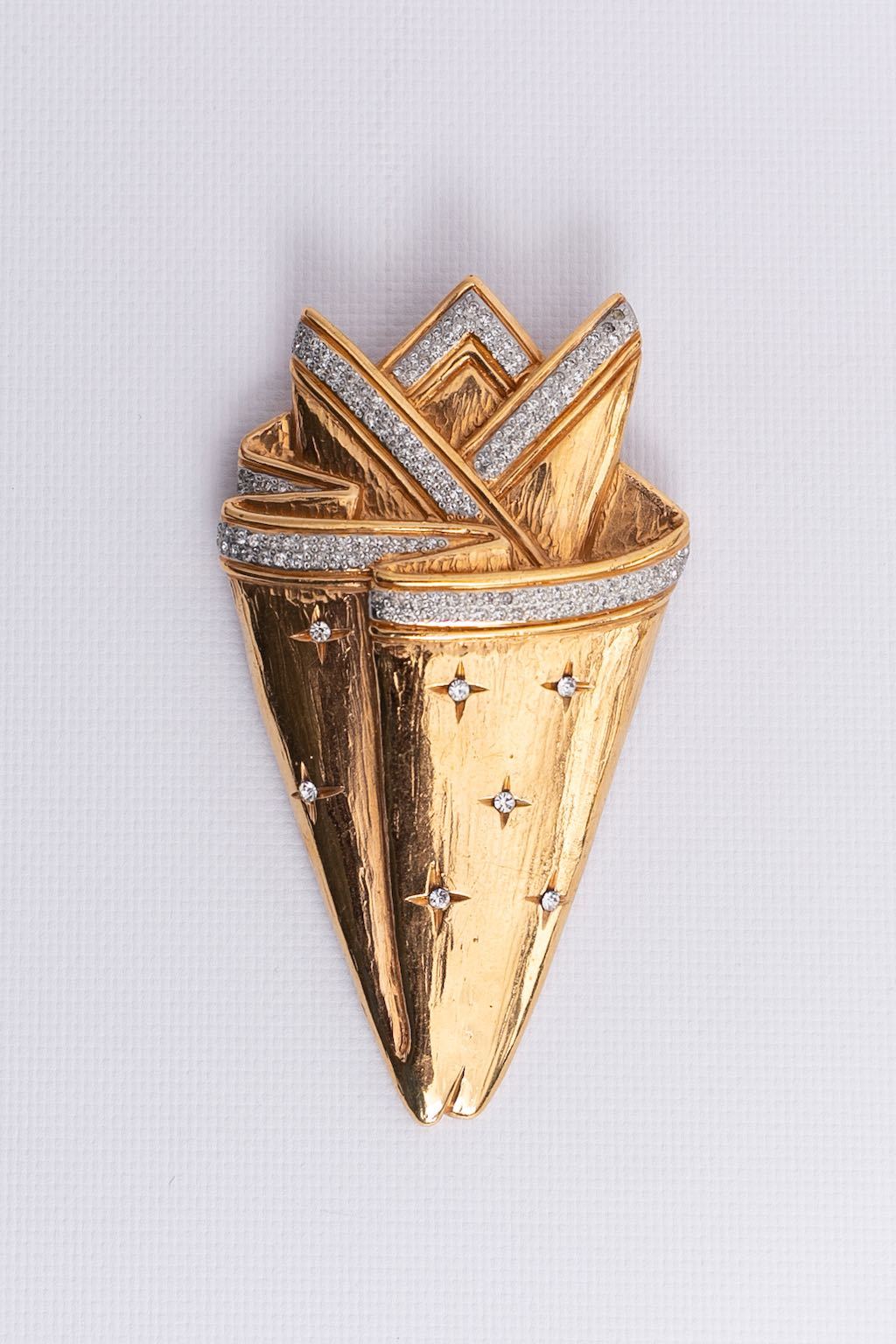 Broche dorée Valentino