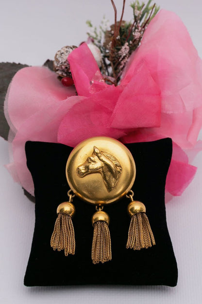 Broche "cheval" en métal doré