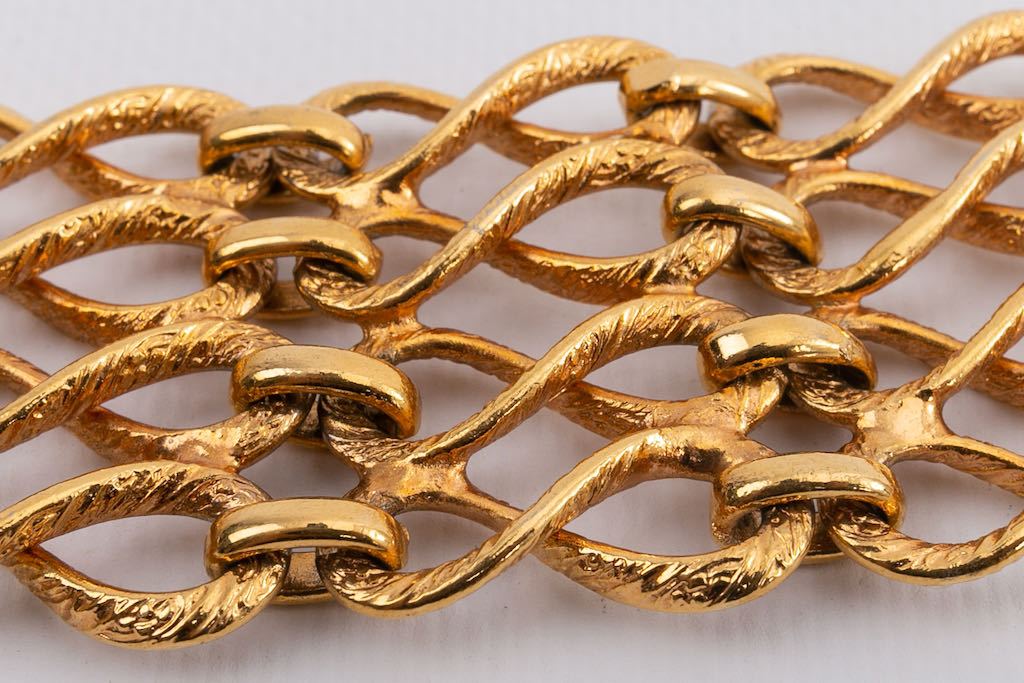 Bracelet articulé en métal doré Chanel