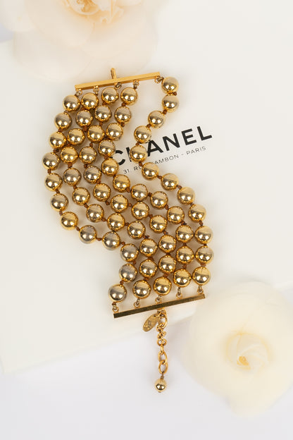 Bracelet de perles dorées Chanel