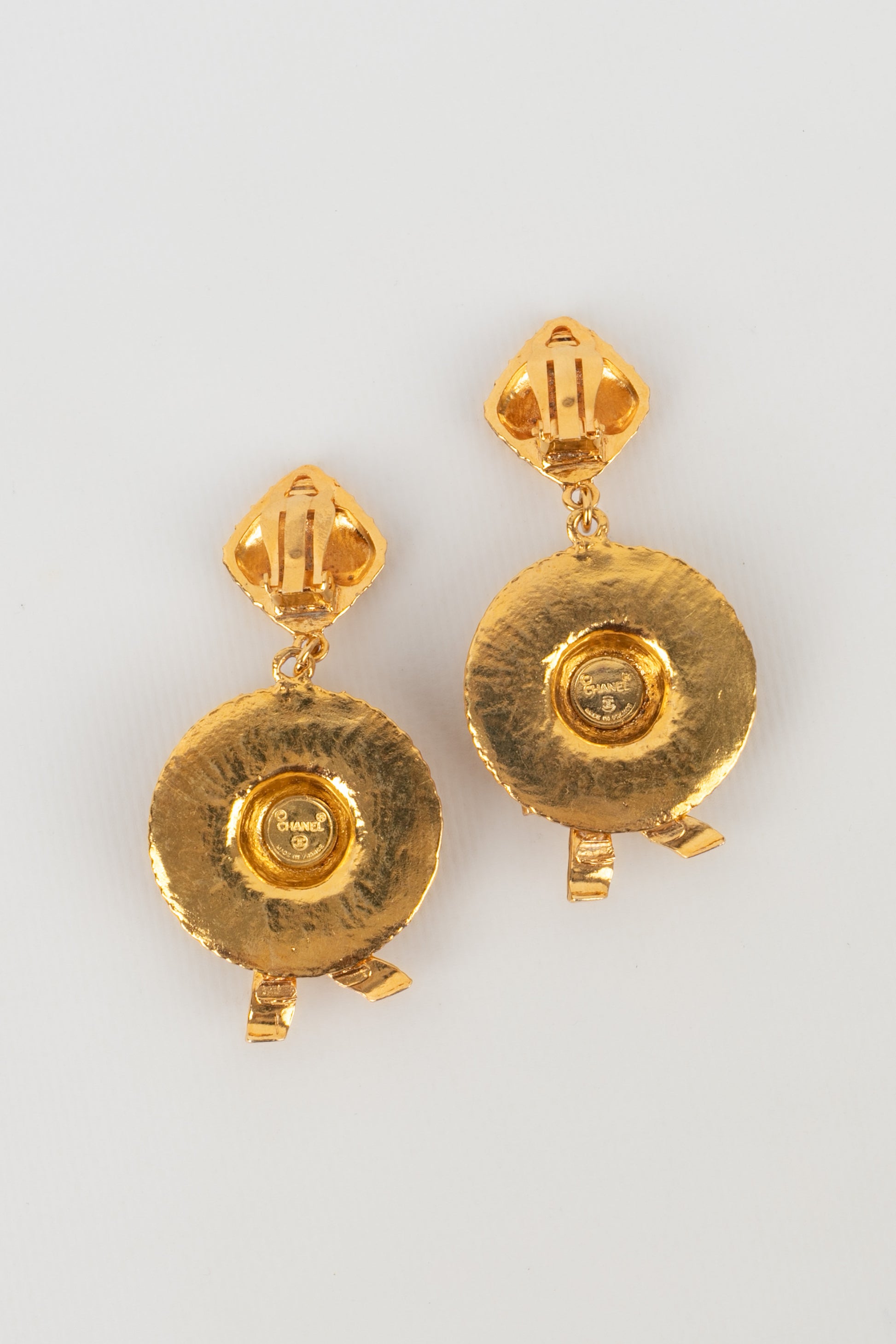 Boucles d'oreilles dorées Chanel 