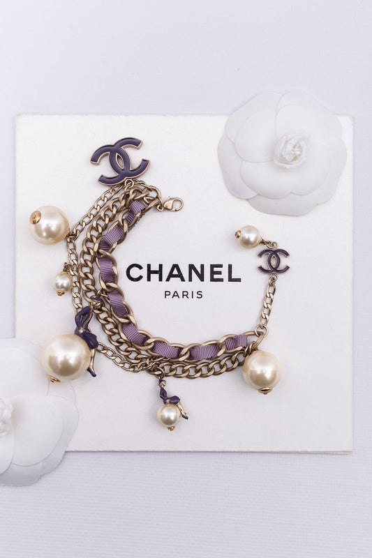 Bracelet Coco sur le Monde Chanel Printemps 2004