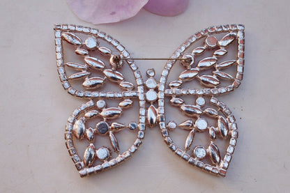 Broche papillon à strass roses et blancs