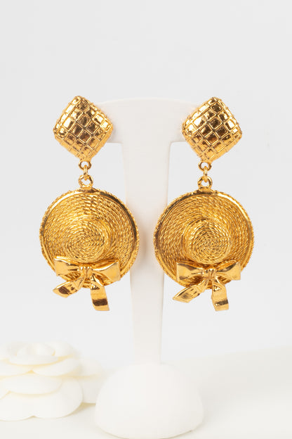 Boucles d'oreilles dorées Chanel 