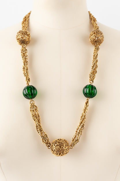 Collier doré Chanel 1984