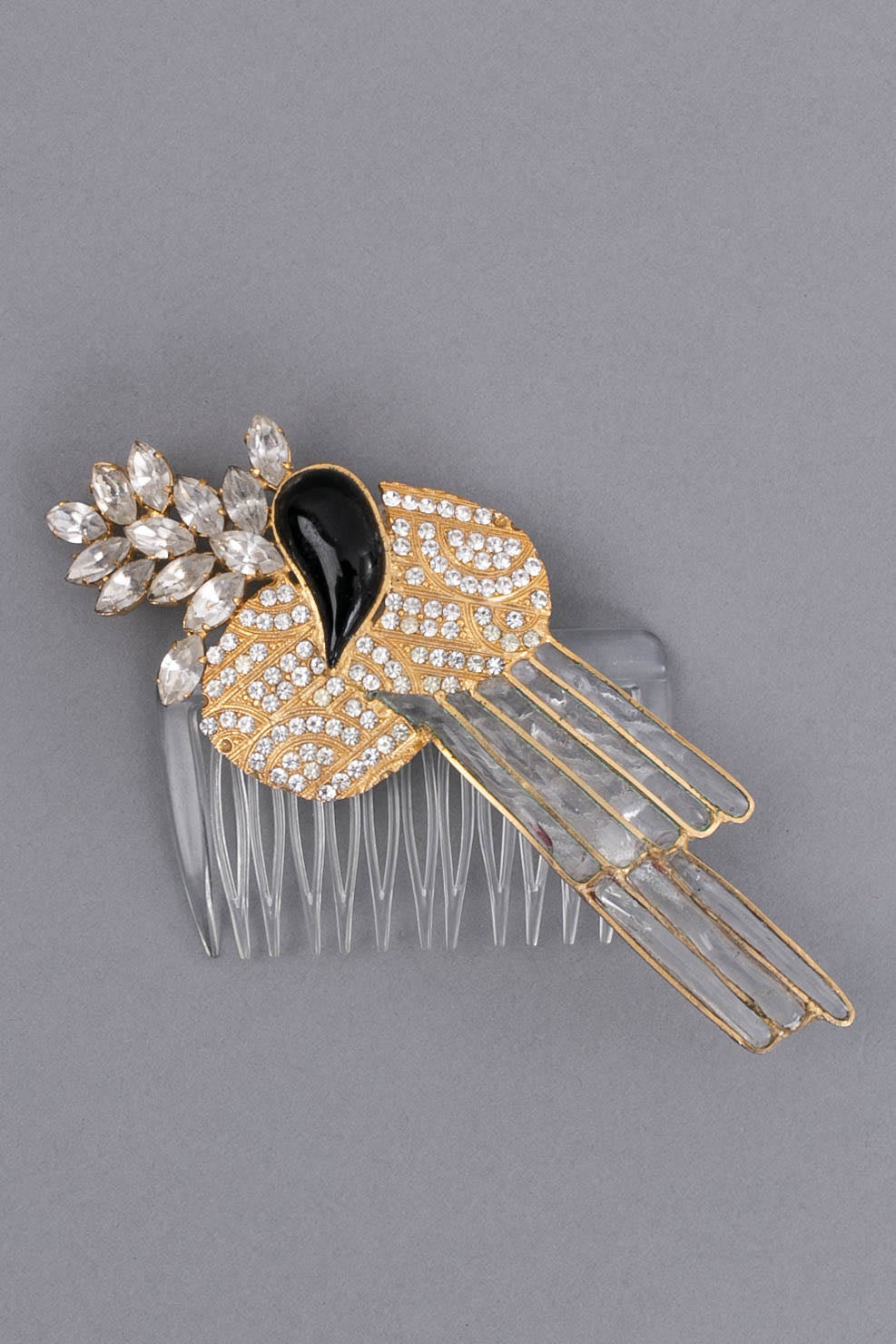 Comb in gilded metal and glass paste