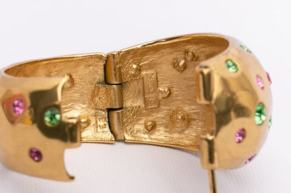 Yves Saint Laurent golden cuff bracelet with rhinestones