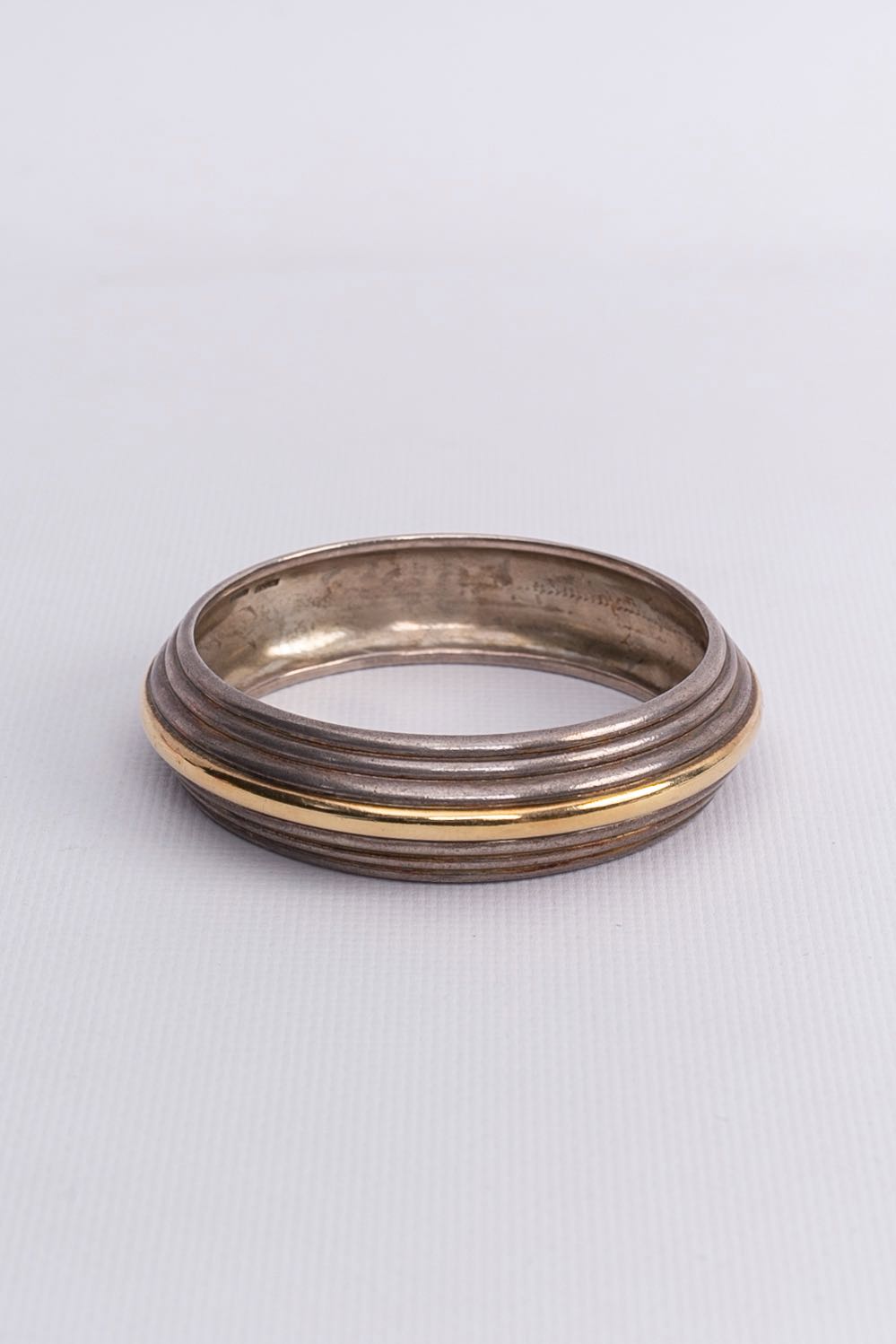Bracelet en or et argent Hermès