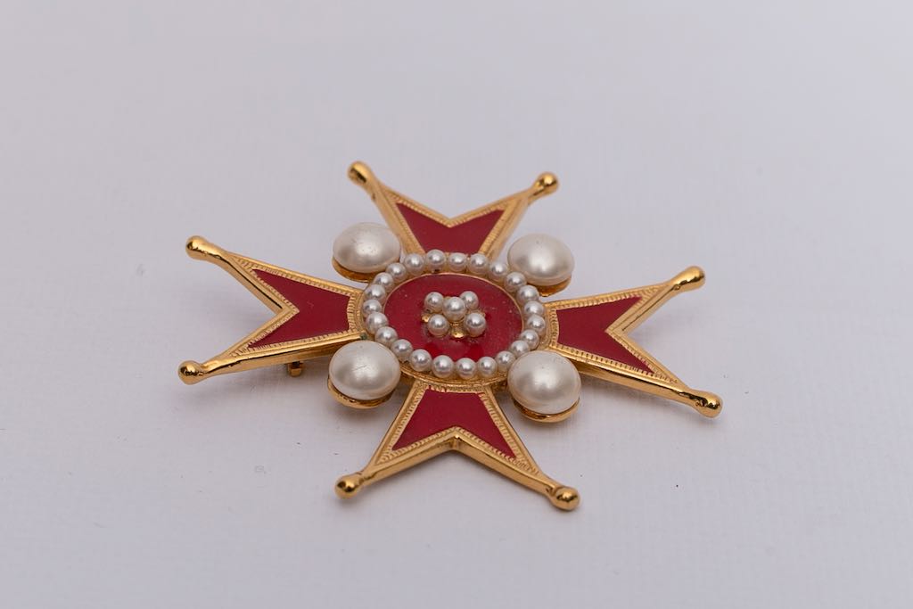Chanel cross-shaped brooch