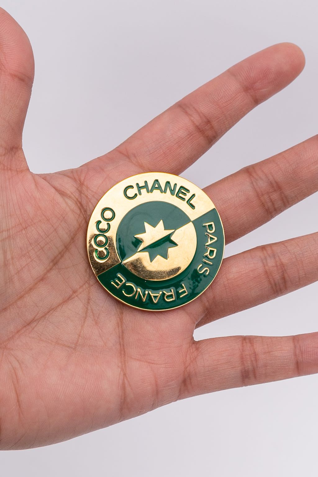 Chanel enamelled brooch