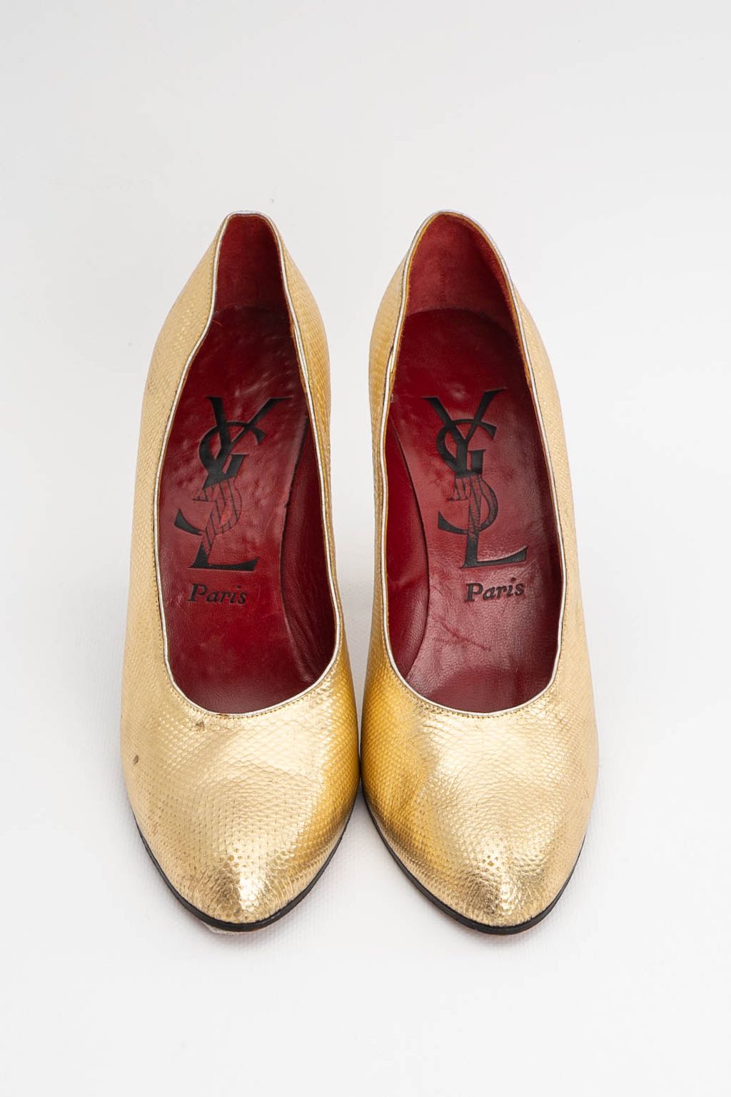 Yves Saint Laurent golden leather pumps