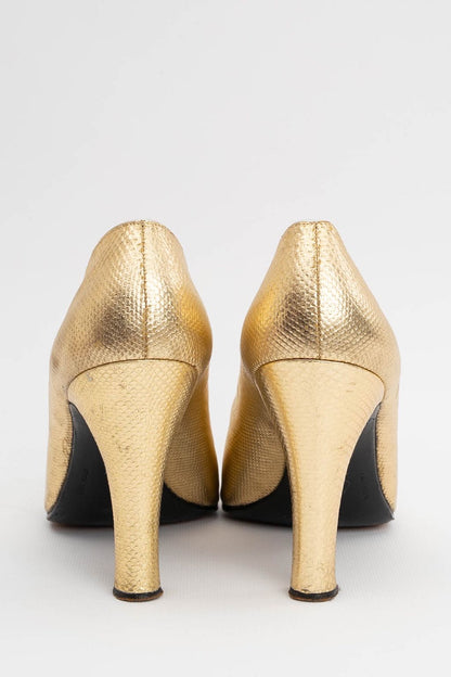 Yves Saint Laurent golden leather pumps