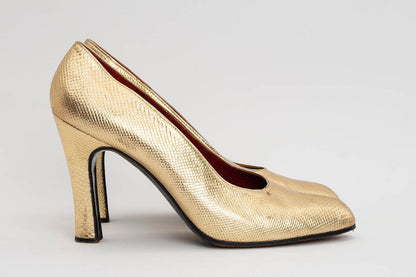 Yves Saint Laurent golden leather pumps