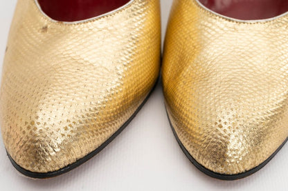 Yves Saint Laurent golden leather pumps