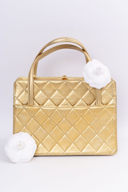 Chanel evening bag in gold leather