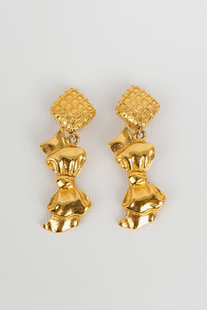 Boucles d'oreilles dorées Chanel 