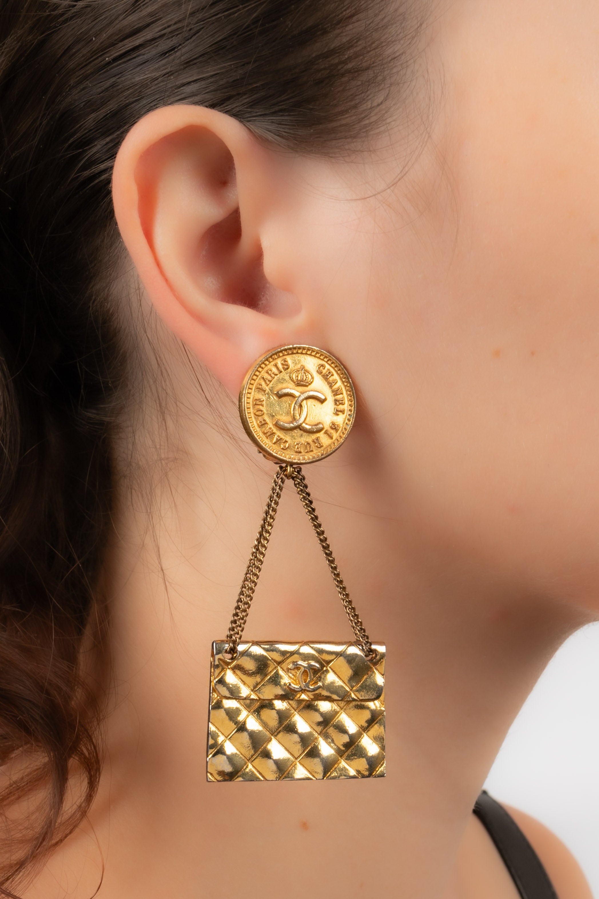 Chanel bag store earrings